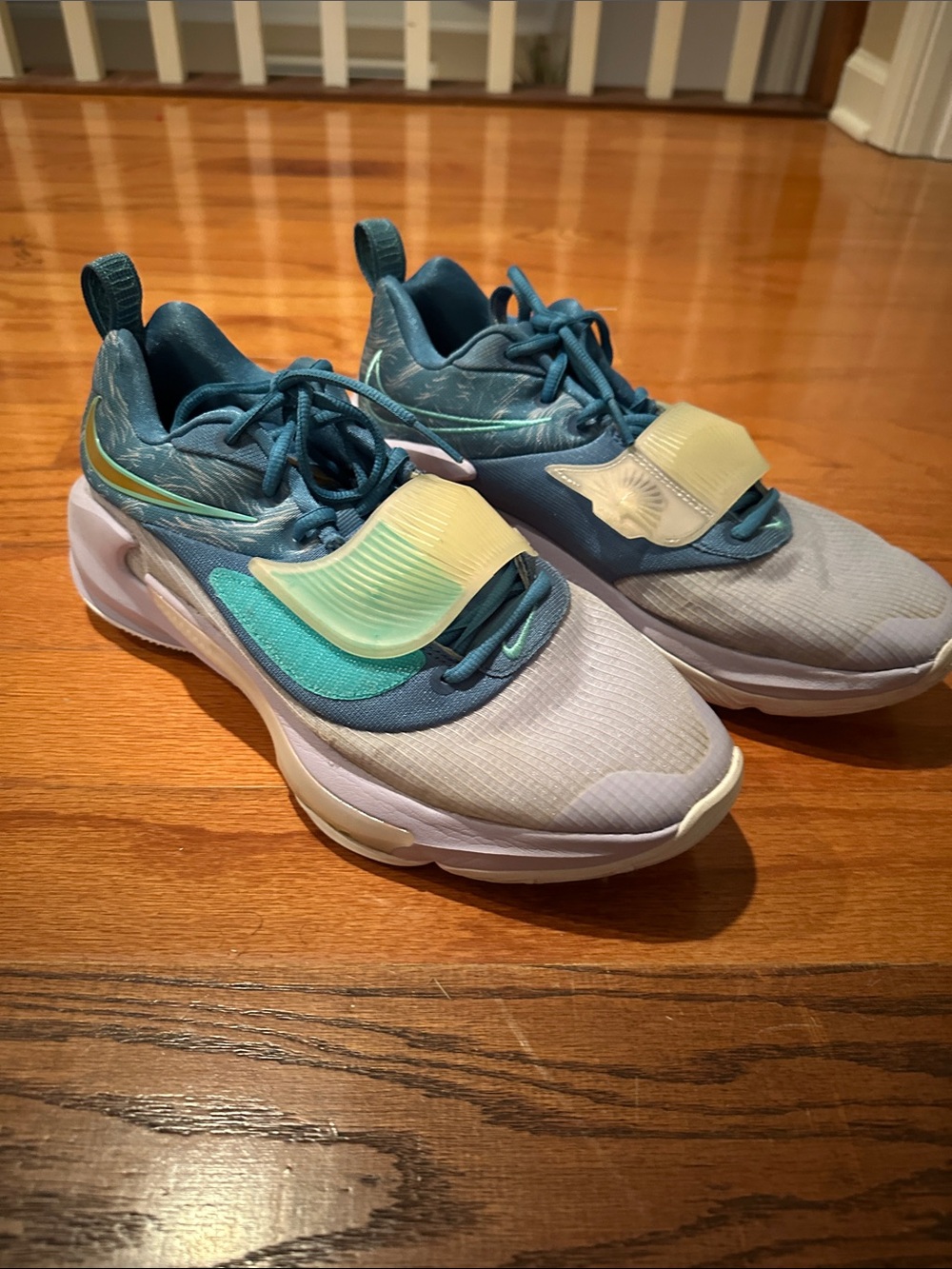 Nike Giannis Basketball Sneakers in Teal, Light Blue, and Pale Yellow